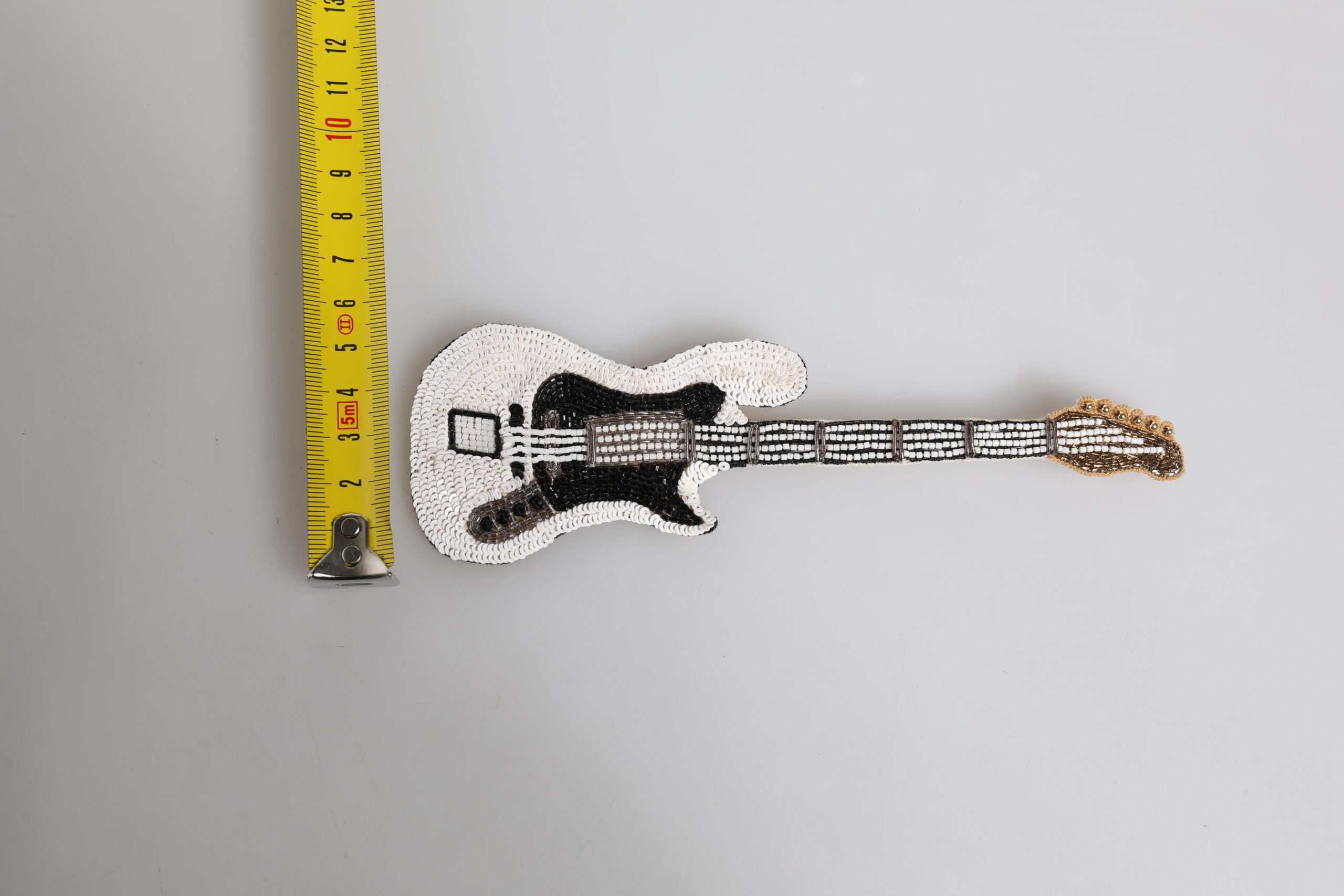 Dolce & Gabbana Gold Brass Logo Beaded Guitar Pin Brooch Dolce & Gabbana